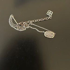 Silver with a grey stone kendra scott necklace